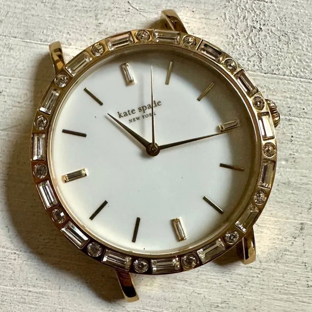 Kate Spade gold tone rhinestone watch face
